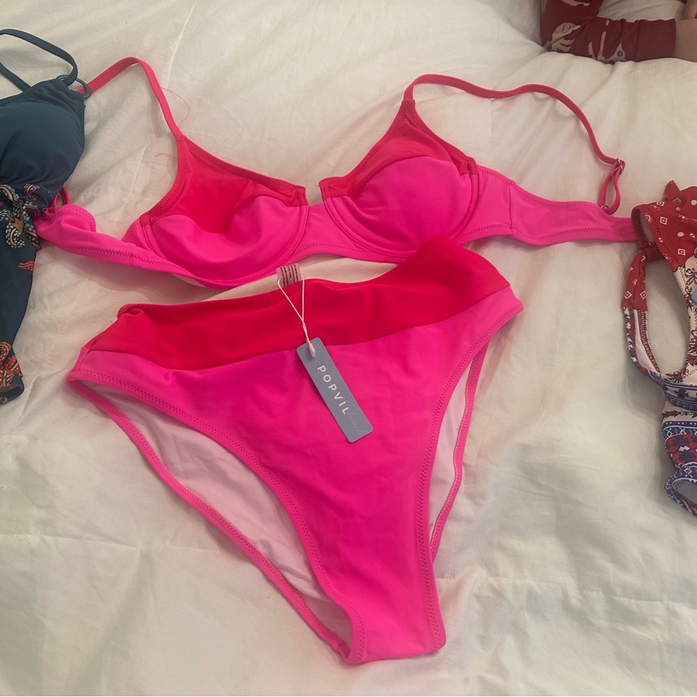 Brand new Popvil swimsuits - size medium. $15 each or $40 for three.